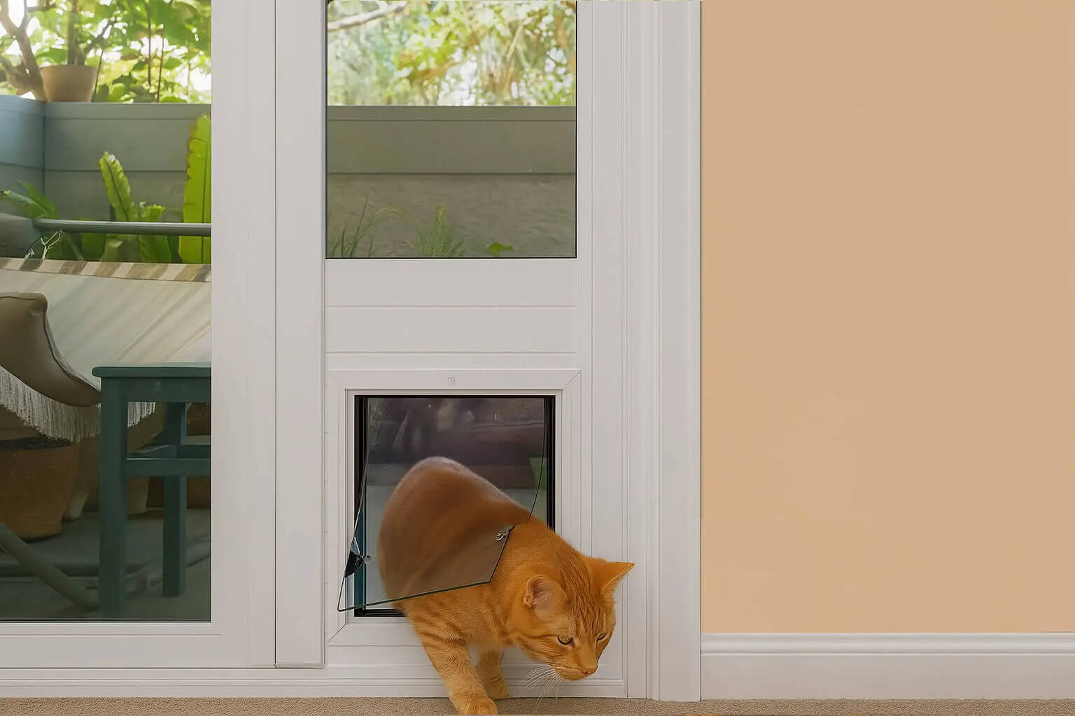 Sliding patio pet door professionally installed by Portal Pros, featuring a secure and energy-efficient design for dogs and cats